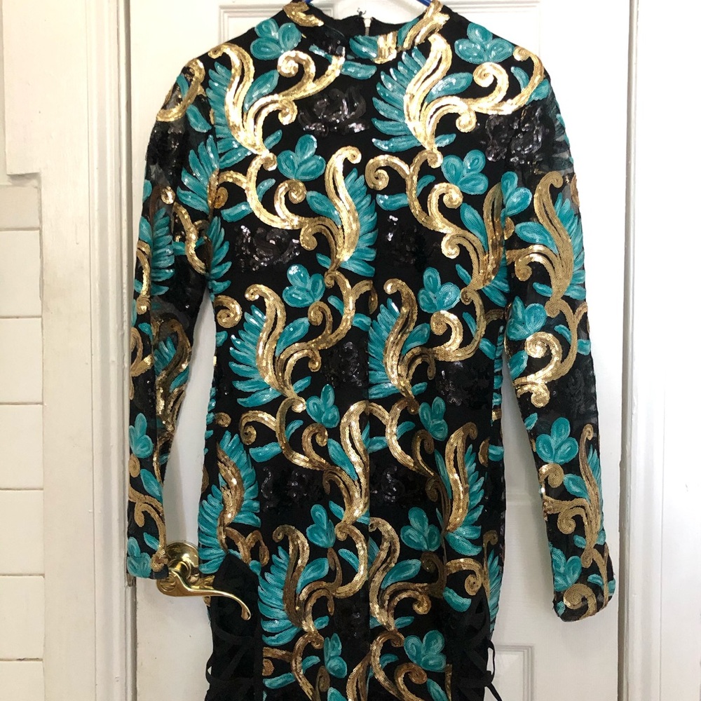 Long sleeved sequin dress